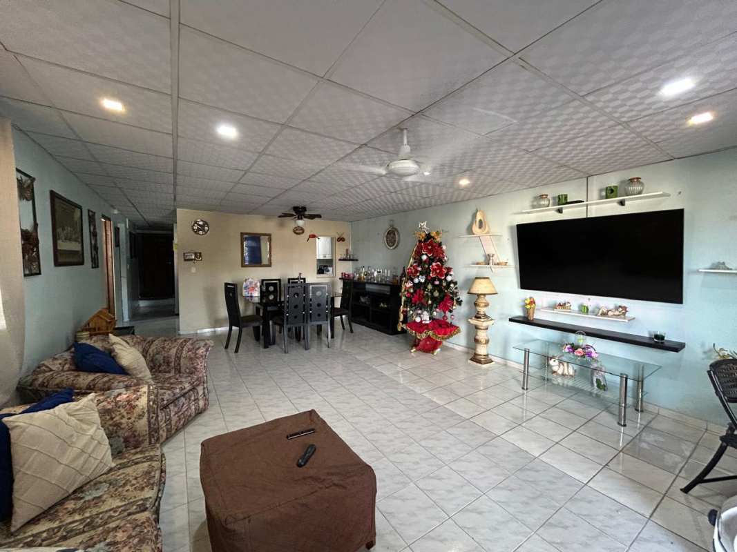 Family room open plan living dining space tiled floor in Casa Real Panama City house