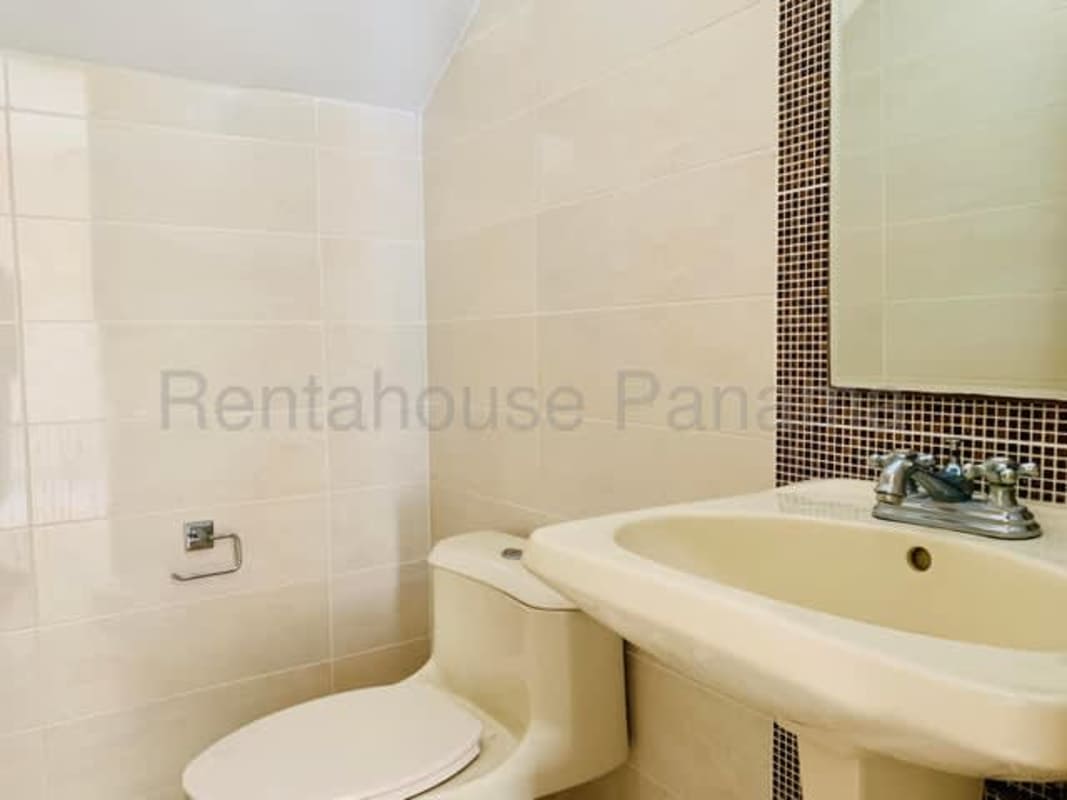 Spacious living room with ceramic tile floors and large windows in PH Victoria Panama City