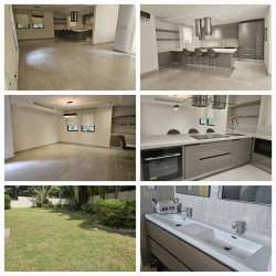 Laundry space with storage cabinets and washer/dryer hookups inside Panama Pacifico home