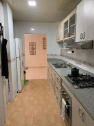 Living area with balcony access and natural light in Residencial Espinar Colón Panama