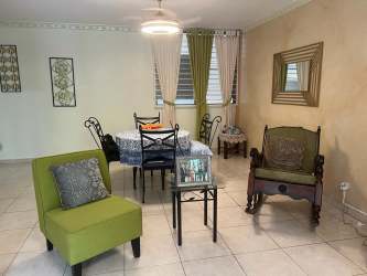 Full bathroom with pedestal sink and ceramic tile in Residencial Espinar Colón