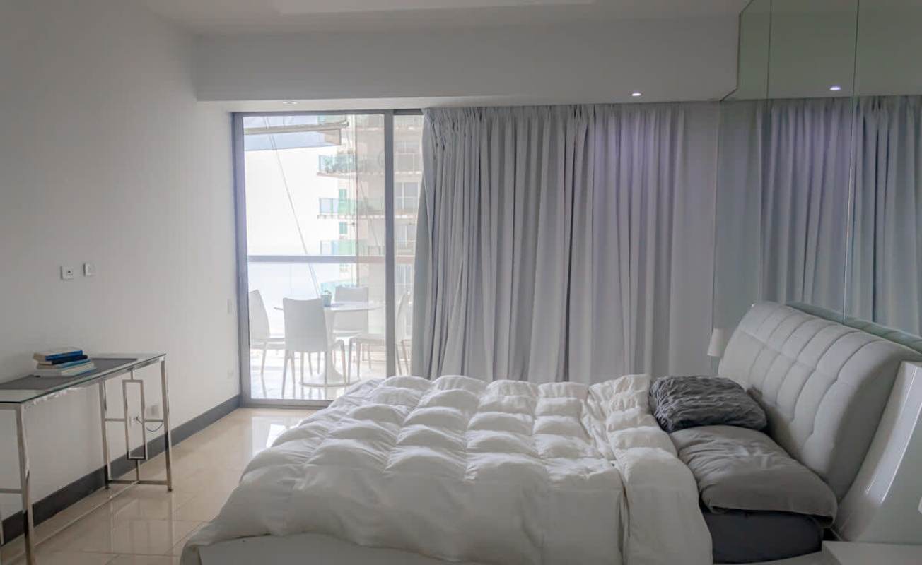 Private balcony with ocean and Panama skyline views at The Ocean Club Panama City