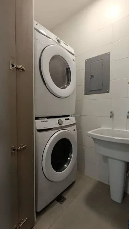 Modern laundry area with washer dryer hookups Victory Wellness apartment Panama