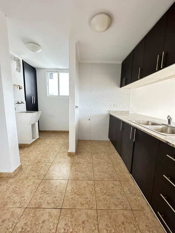 Bedroom with large window and tile floors PH Cosmopolitan Tower Panama City