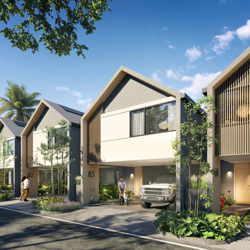 Open-plan living and dining room with double-height ceiling in eco house Panama Norte