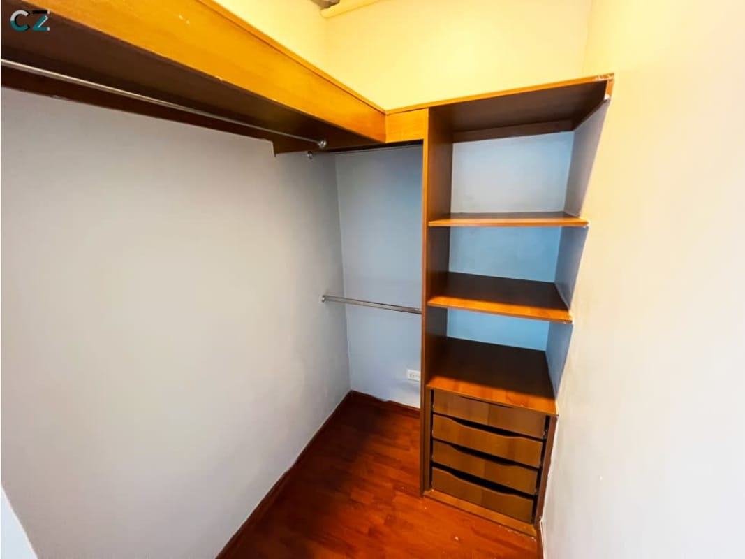 Modern bathroom with granite countertop, glass shower enclosure PH Blue Park Bella Vista