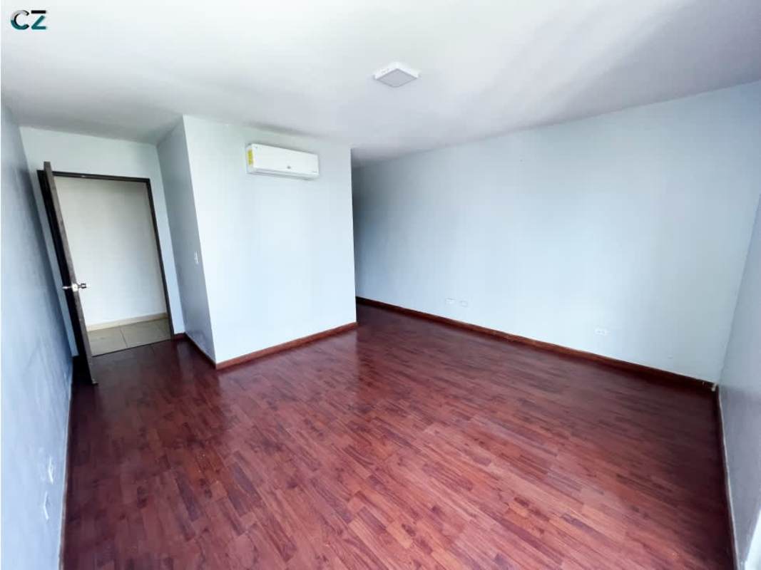 Bright bedroom with wardrobe closet and windows in PH Blue Park Panama City