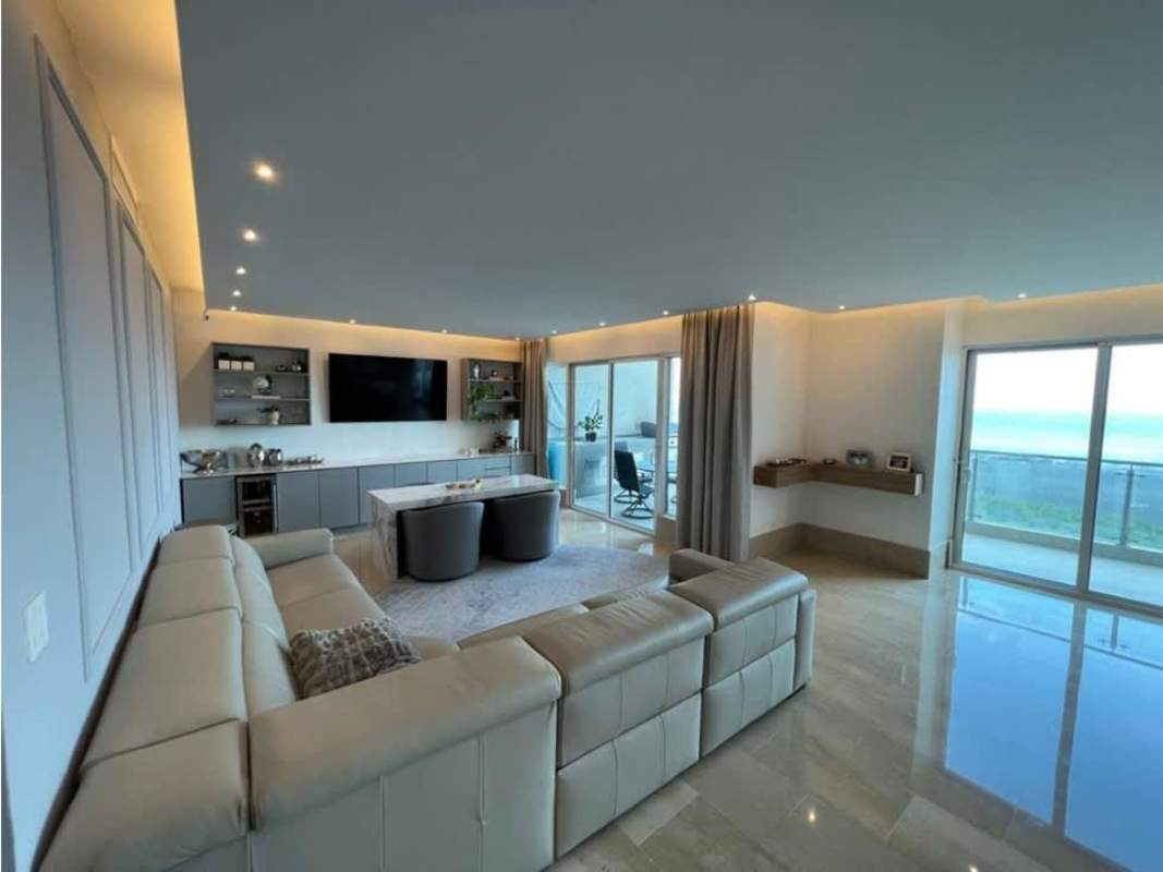 Spacious master bedroom with private balcony and ocean view at PH Zeus Costa del Este Panama