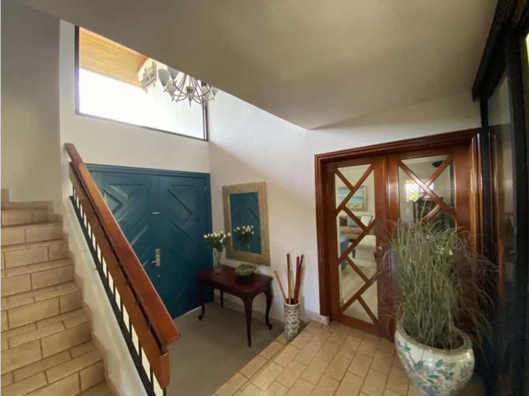 Modern walk-in closet with built-in storage shelves in luxury house, San Francisco Panama