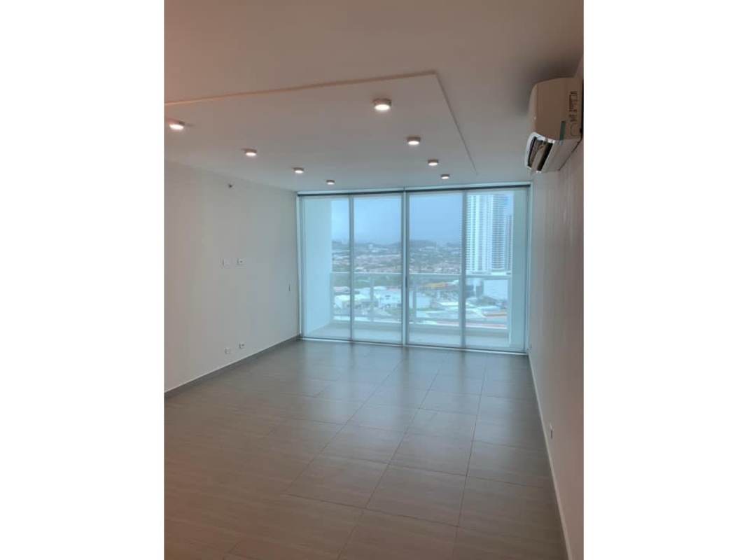 Bright living room with floor-to-ceiling windows and city view in PH Asia Costa del Este Panama