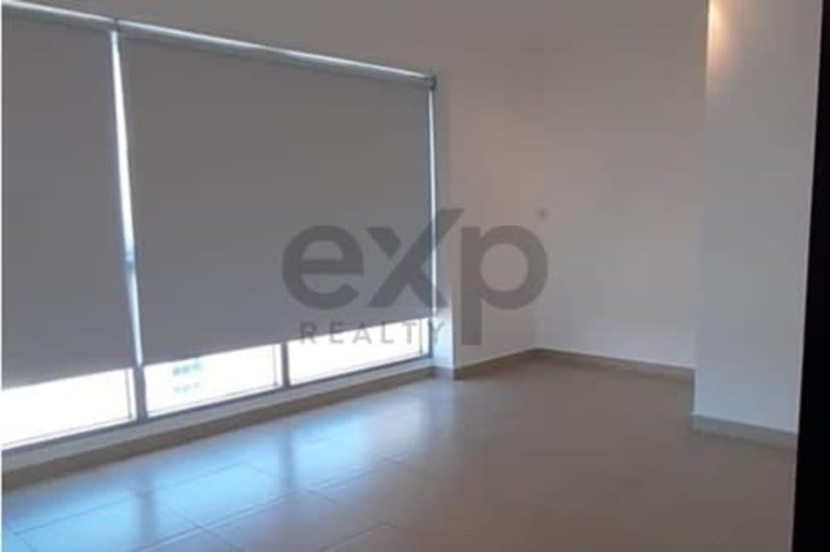 Spacious apartment bedroom with floor to ceiling windows ocean view walk-in closet PH BICSA Panama City
