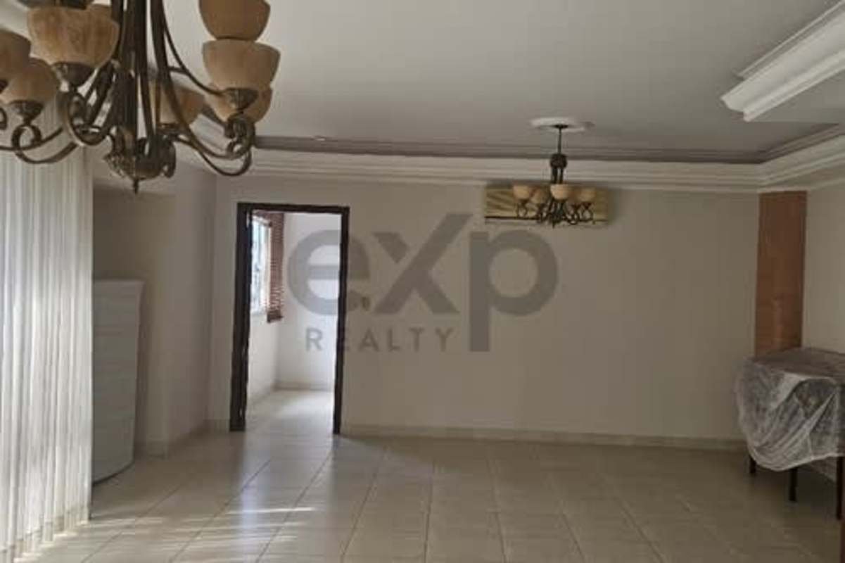 Elegant dining room area with tile floor, natural light, skyline views in Victoria Tower Panama City