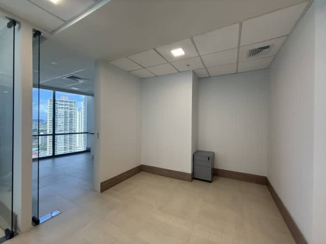 Furnished open workspace with large windows and panoramic views