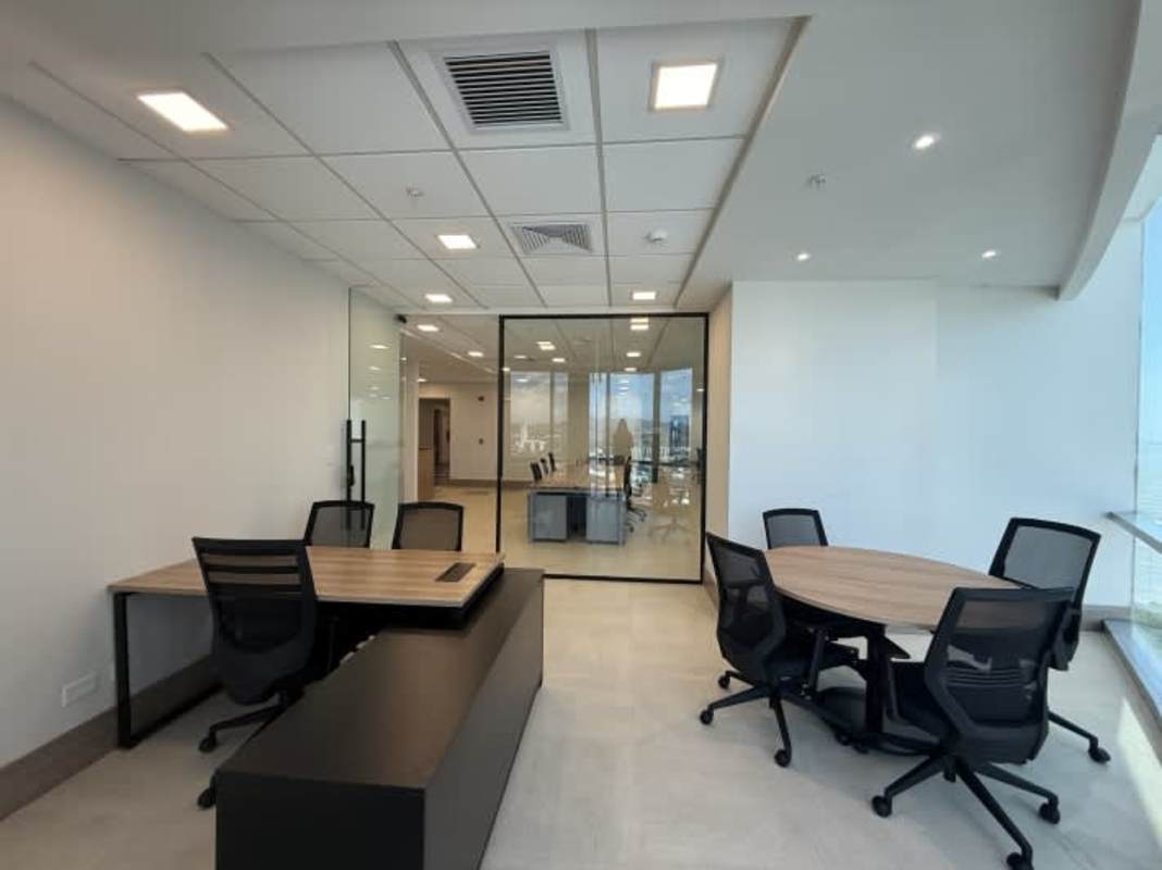 Private executive office with desk and city view PH Costamare