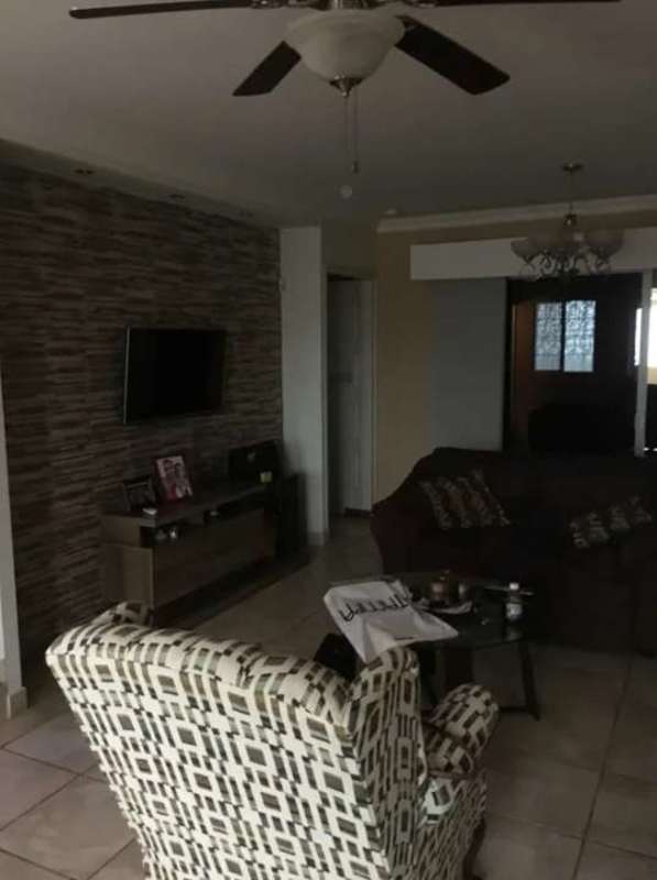 Laundry area with washing machine, utility sink and storage in duplex house Brisas del Golf Panama