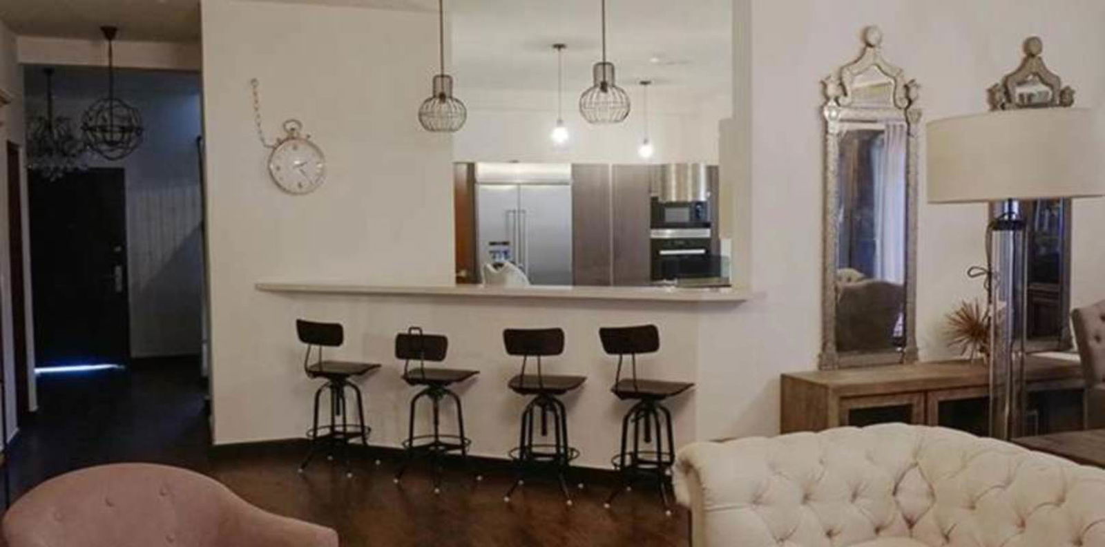 Bedroom with workspace, wall TV, sideboard cabinet in luxury Clayton villa Panama