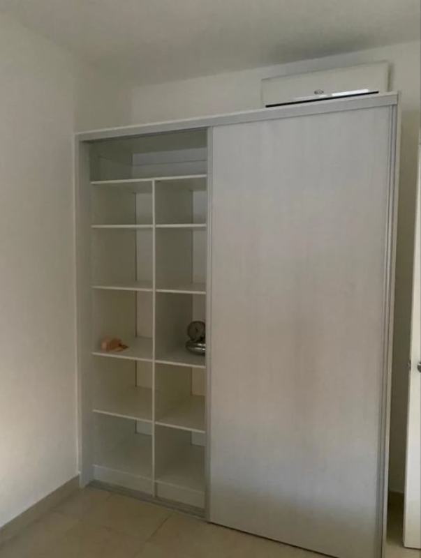 Bedroom with modern closet and split AC unit inside PH Versalles Gated community Panama