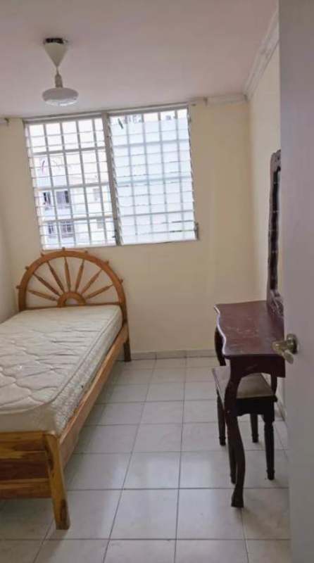Bedroom corner with built-in closet white tile floors PH Parque Lefevre Panama City