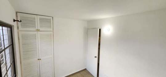 Utility area with water heater, laundry space in Santa Clara Panama beach home