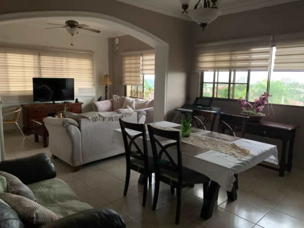 Spacious open plan living and dining area with large windows Betania gated community