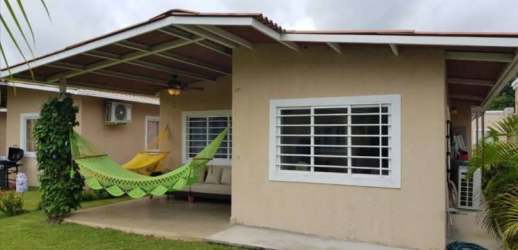 Covered porch with hammocks and garden view PH Coronado Residencial Panama