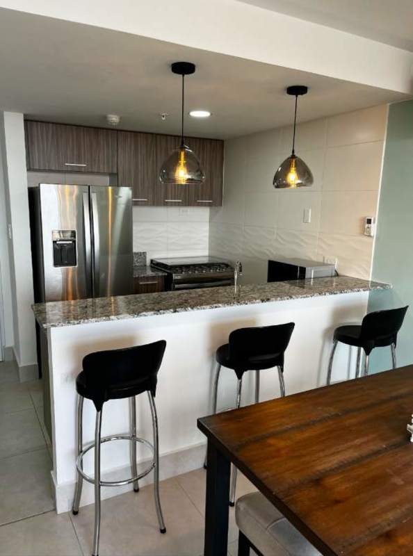 Bedroom bright with large windows, split AC, neutral decor, Condado del Rey Panama furnished rental