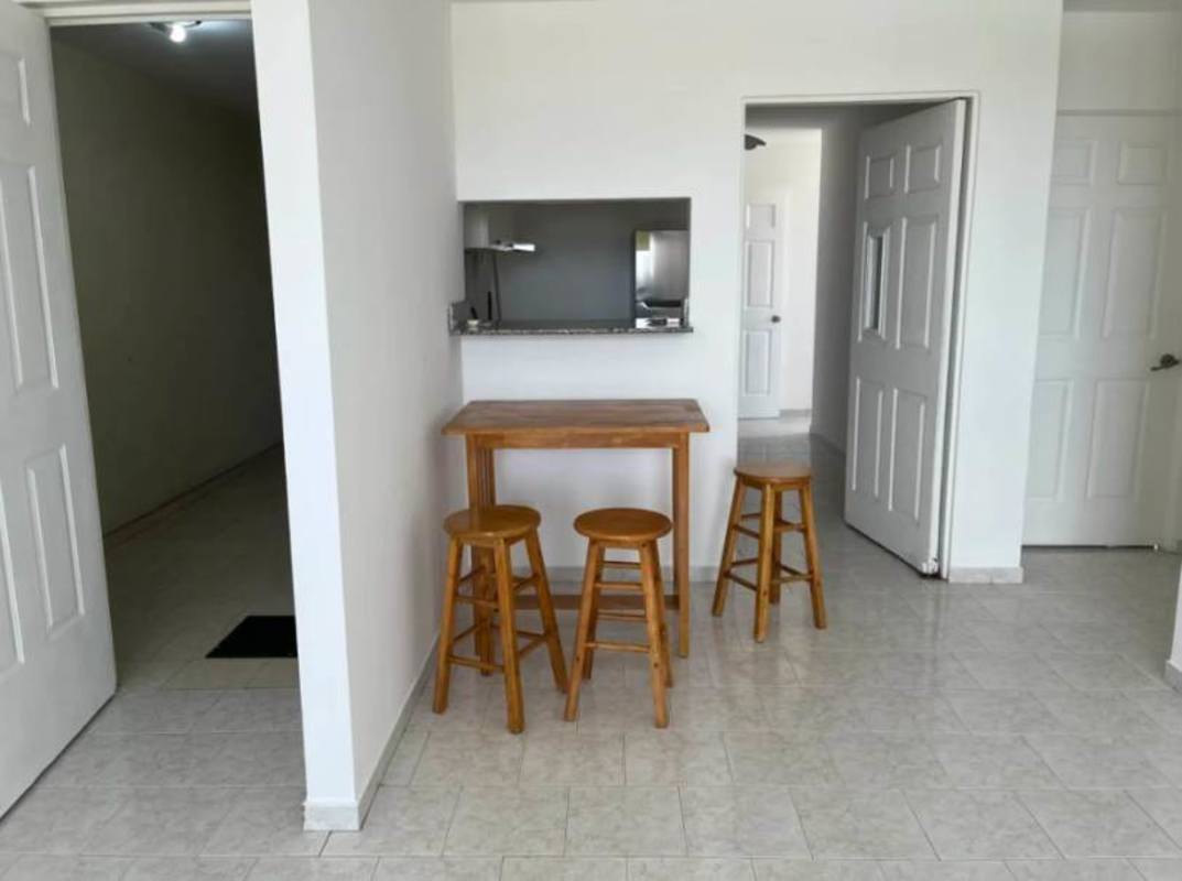 Dining area with breakfast bar open to kitchen PH Parque Lefevre Panama City