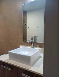 Contemporary bathroom with vessel sink, vanity and glass shower River Valley Panama Pacifico