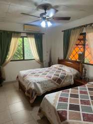 Bright bedroom with ensuite bathroom, large windows, garden views Coronado beach