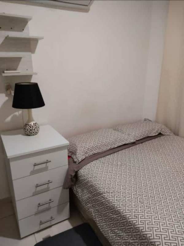 Compact modern bedroom with closet AC and natural light in Llano Bonito Panama City