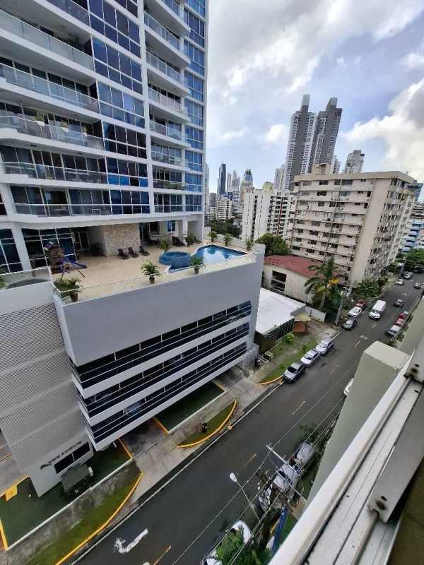 Rooftop swimming pool terrace with skyline view at PH La Condesa El Cangrejo