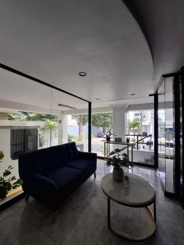 Lobby entrance with glass walls and modern design PH La Condesa Panama