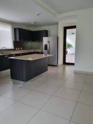 Master bedroom with closet, split AC, and natural light in Panama Pacifico apartment