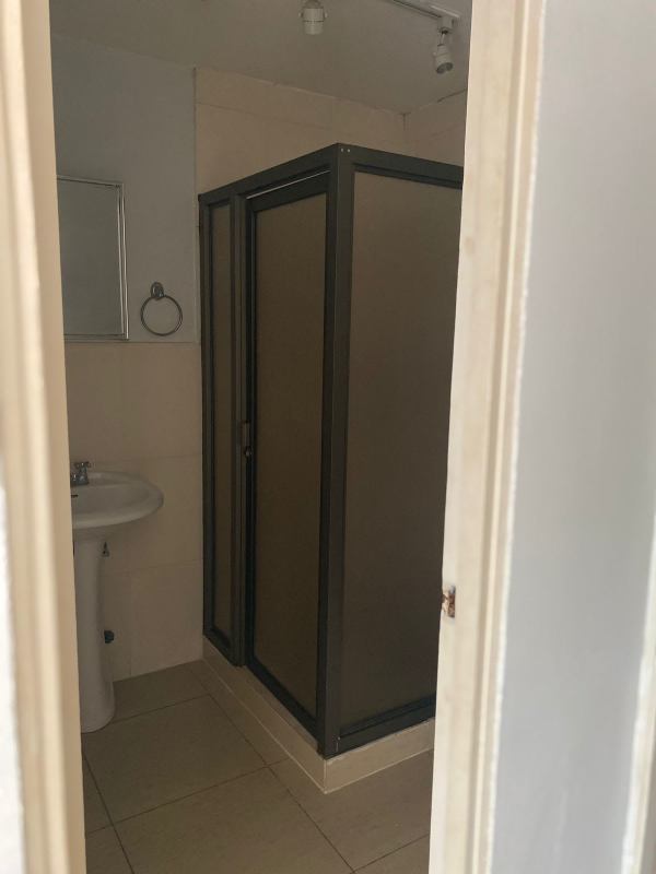 Bright bedroom with closet, ceiling fan, tiled floor in PH Carrasquilla Urban Center Panama City