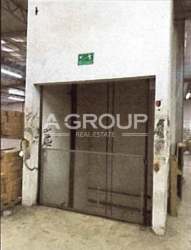 Large freight elevator and loading area inside commercial warehouse Zona Libre Colon