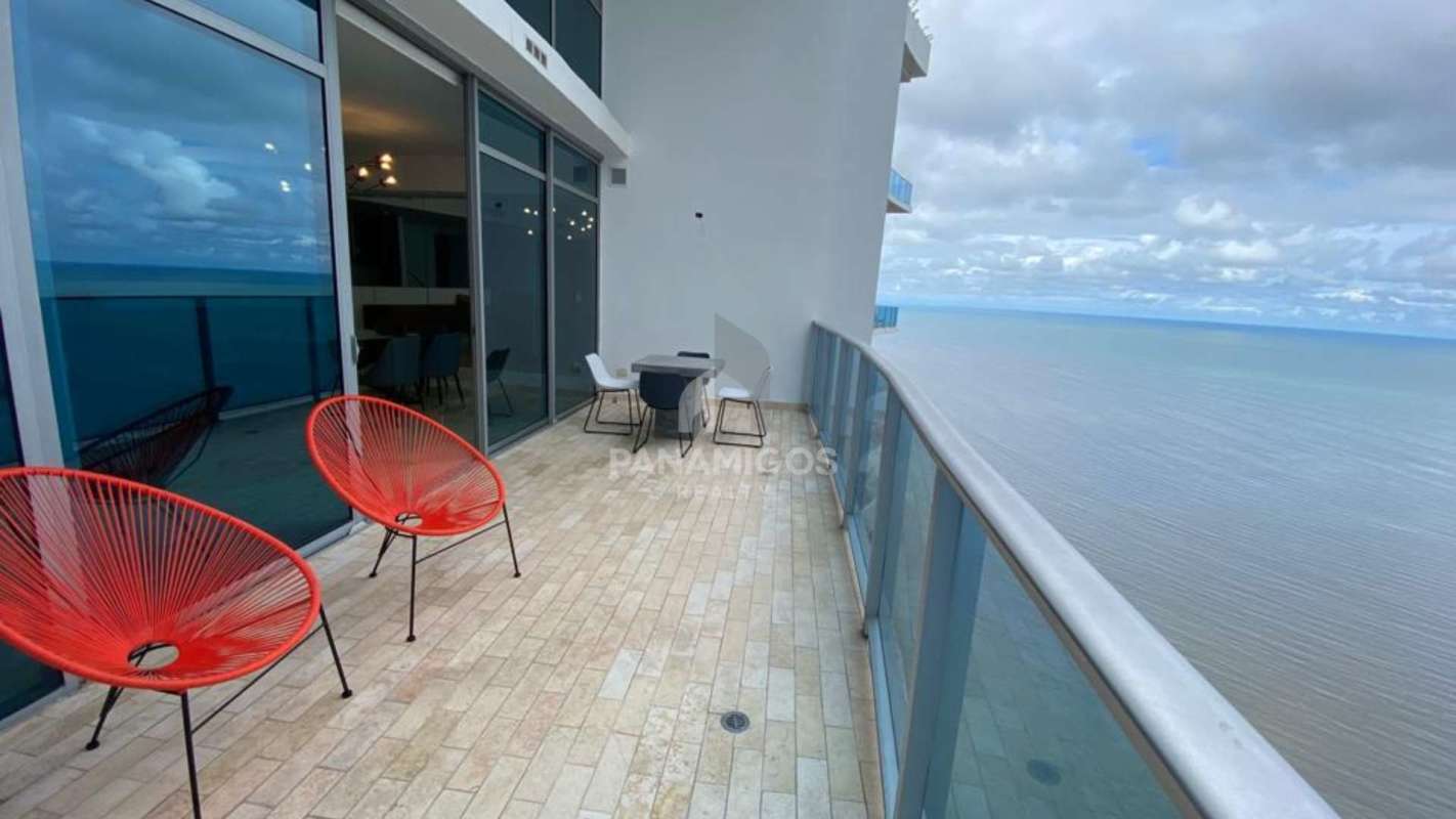 Private balcony overlooking the Pacific Ocean and skyline from Grand Tower apartment Panama