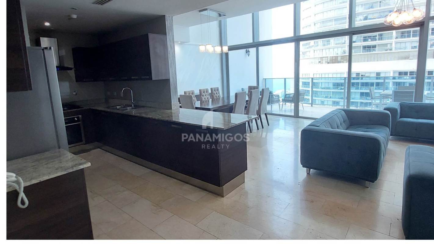 Master bedroom with ocean skyline views large window at Grand Tower Panama City