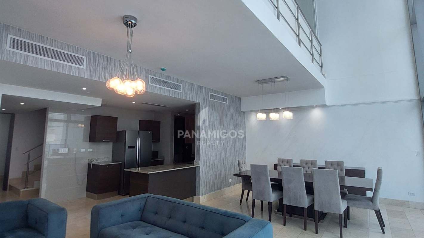 Open kitchen with granite countertops and stainless appliances at Grand Tower Punta Pacífica