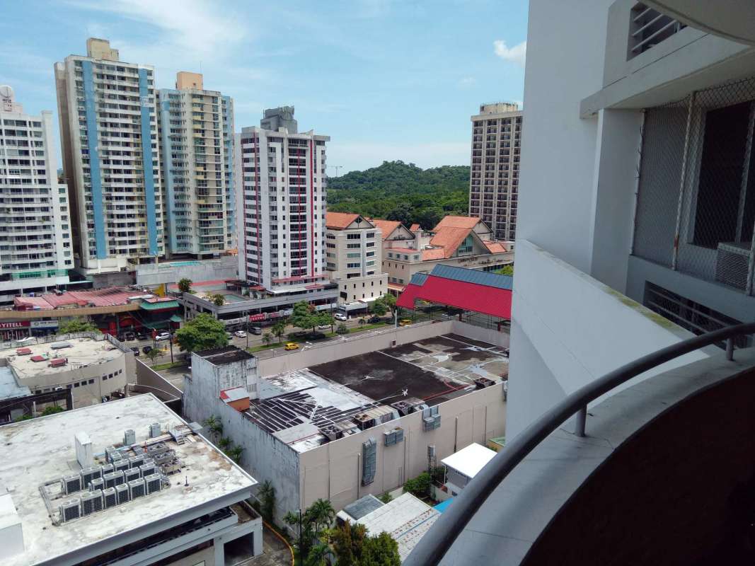 Facade of Park View II residential building with security booth, gated parking El Dorado Panama