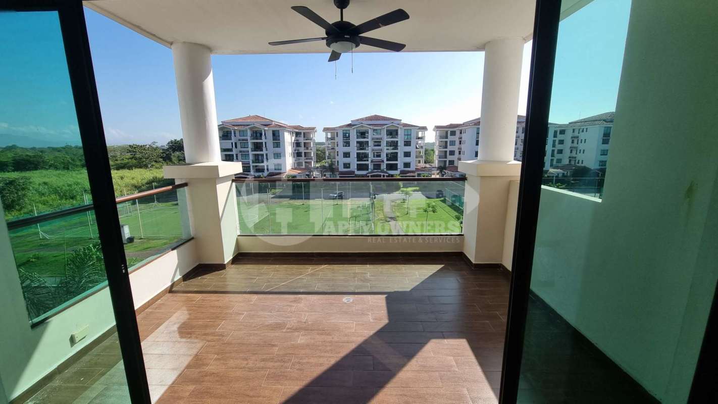 Spacious bedroom with large window wood tile floors split AC in PH Costamare Costa Sur Panama