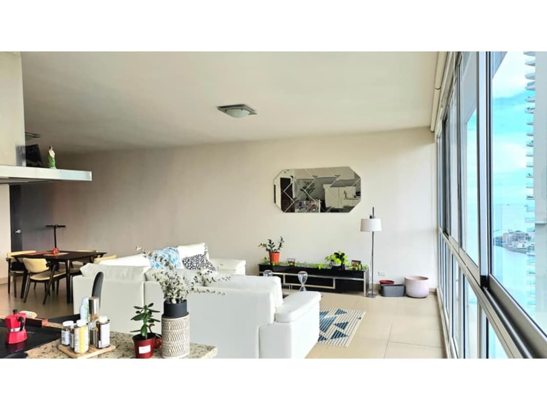 Bright furnished bedroom with floor to ceiling windows skyline view PH Oceanaire Panama