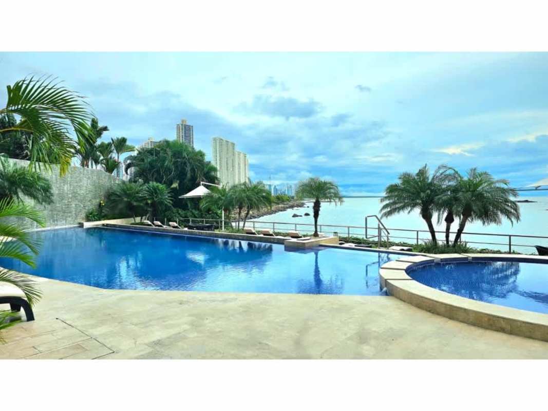 Luxury infinity pool overlooking ocean skyline at PH Oceanaire Punta Pacifica Panama
