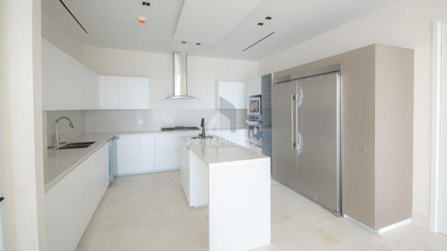 Minimalist white luxury kitchen island built-in appliances PH Beach Club Ocean Reef Panama