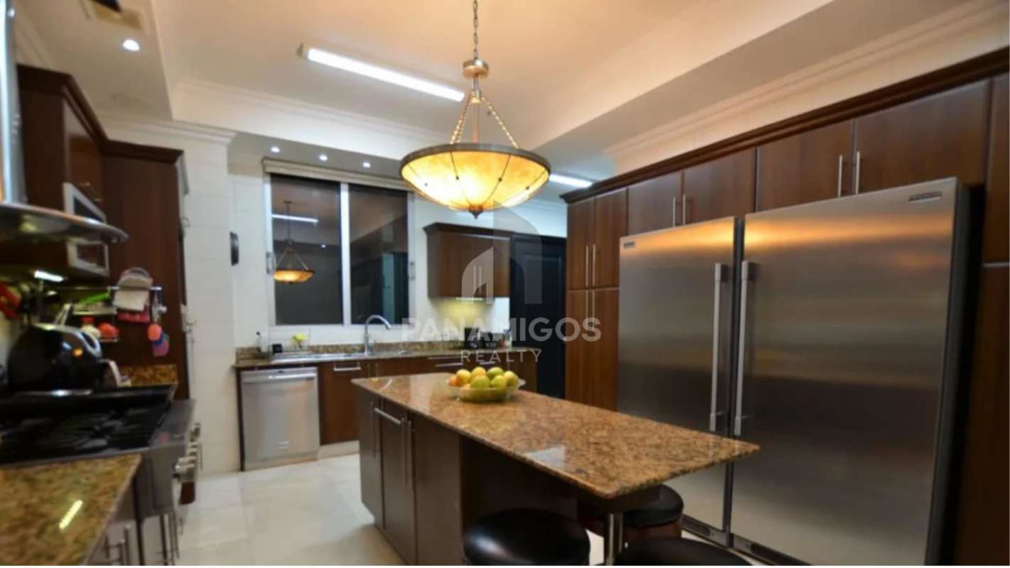 Kitchen with granite countertops island stainless steel appliances in PH Ocean Two Panama