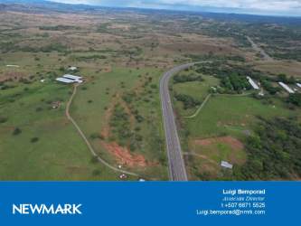 Expansive aerial farmland view in Santiago Veraguas Panama with green pastures barns and dirt roads
