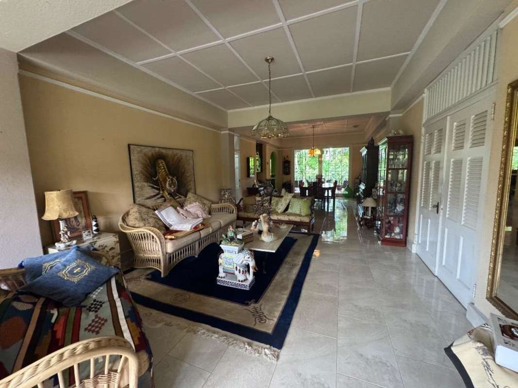 Traditional living room with wicker sofas bright space in Clayton Albrook Panama