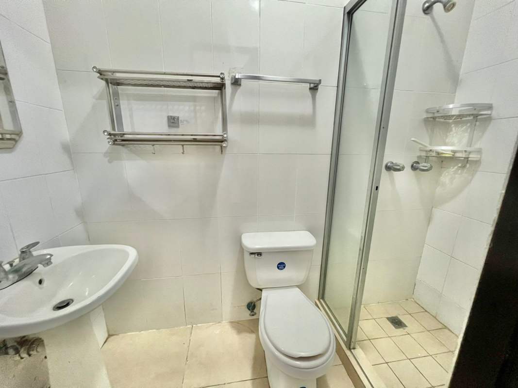 Bright living dining room with Pacific Ocean views floor-to-ceiling windows in Rivage Tower Panama