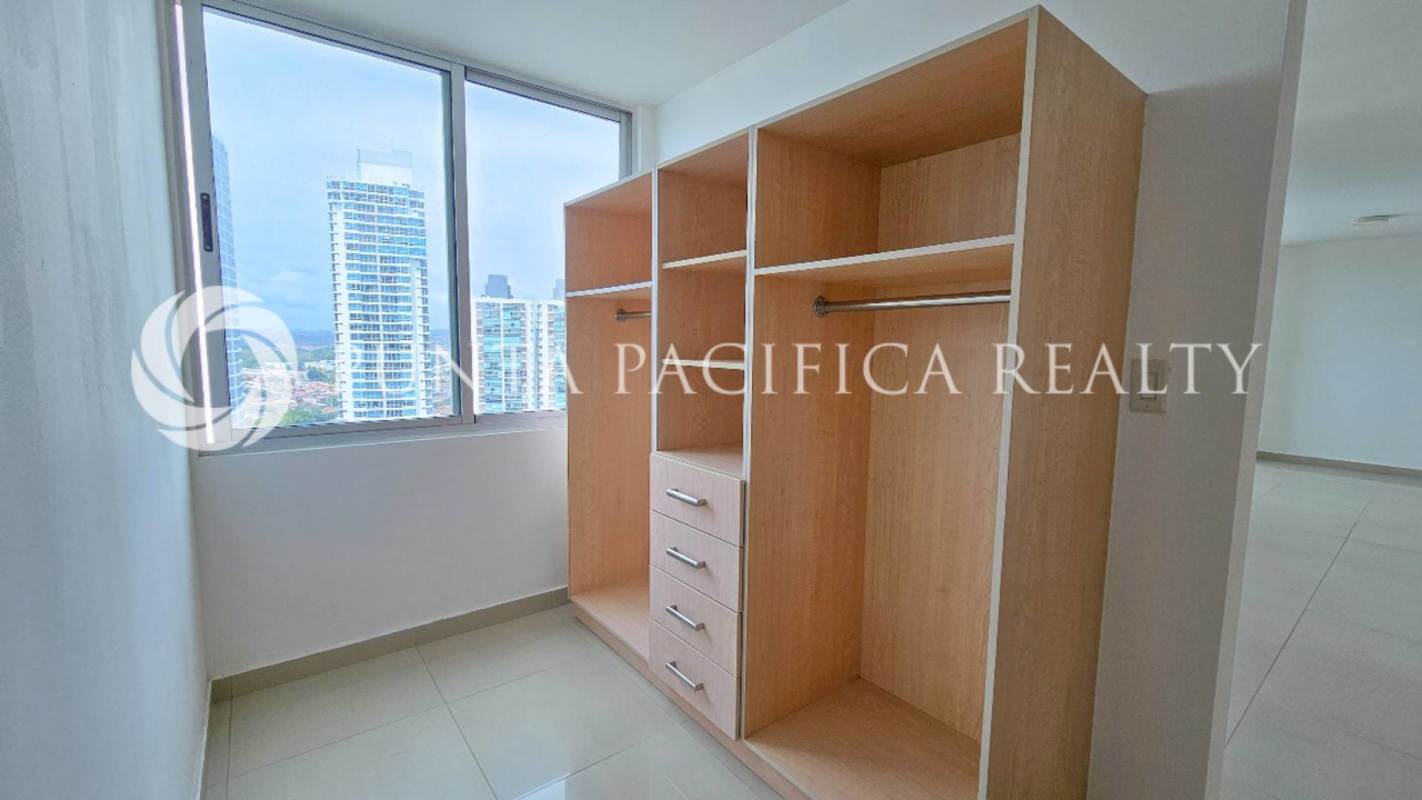 Open plan dining and living area with balcony access at PH Sevilla Costa del Este Panama City