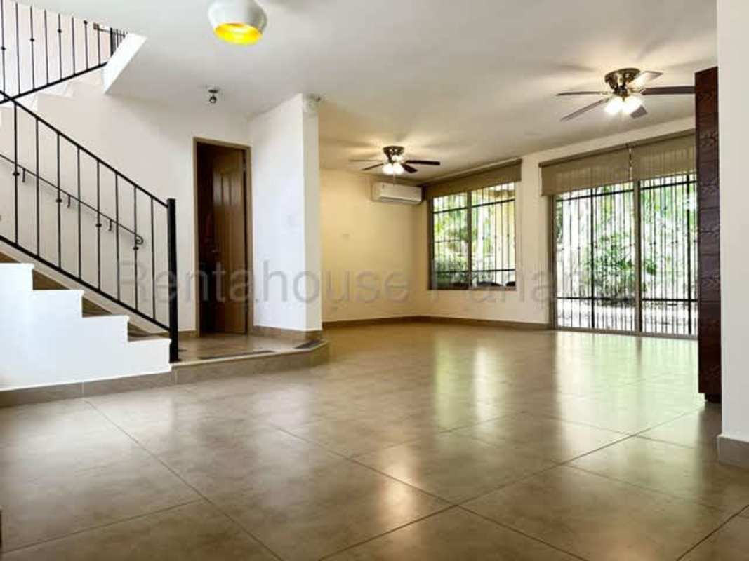 Wood cabinetry kitchen with granite counters and appliances Embassy Gardens Clayton