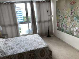 Bedroom with large closet minimalist decor AC in beachfront Coronado Bay Panama rental